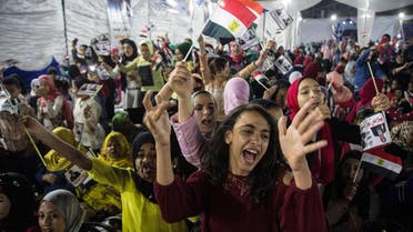 Egyptian supporters of President Abdel Fattah al-Sisi attend a rally in a neighbourhood in Cairo on March 9, 2018. (AFP)