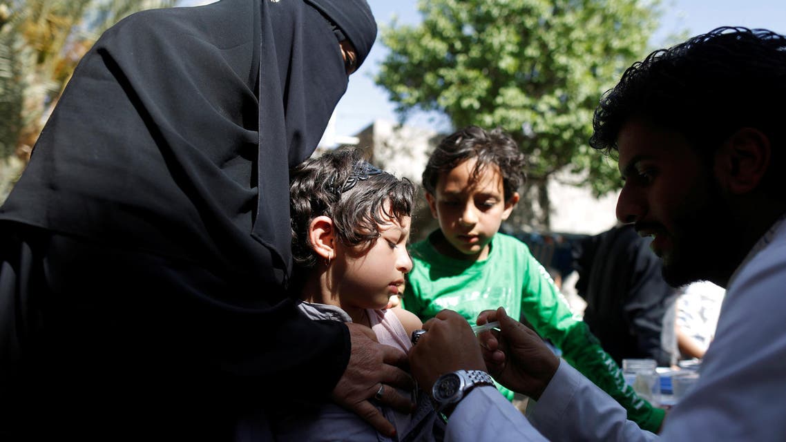 A girl receives a diphtheria vaccine during vaccination campaign in Sanaa, Yemen March 13, 2018. REUTERS