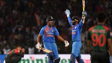 Indian cricketer Dinesh Karthik (2nd R) and Washington Sundar (2nd L) react after scoring the winning run to defeat Bangladesh by 4 wickets during the final Nidahas Twenty20 Tri-Series in Colombo.  (AFP)