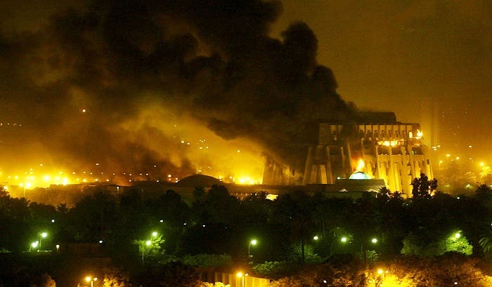 An explosion rocks Baghdad during air strikes, March 21, 2003. (Reuters)