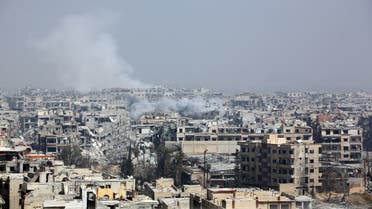 Smoke billows following Syrian government bombardment on the rebel-held besieged town of Harasta, in the Eastern Ghouta region on the outskirts of Damascus on March 12, 2018. Syrian regime forces cut off the largest town in Eastern Ghouta from the rest of the opposition enclave in a blow to beleaguered rebels defending their last bastion near Damascus. Government troops and allied militia have recaptured half of the besieged region in a blistering assault launched on February 18 that has left nearly 1,000 civilians dead and prompted global outcry. AFP