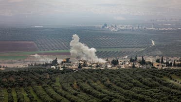 A picture taken on February 10, 2018 from the Syrian village of Atme in the northwestern province of Idlib shows smoke plumes rising in the village of Deir Ballut in the Afrin region. (AFP)