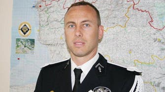 French officer who swapped himself for hostage dies, hailed as hero