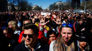 Attendees are seen as students and gun control advocates hold the “March for Our Lives” event demanding gun control after recent school shootings at a rally in Washington, on March 24, 2018. (Reuters)