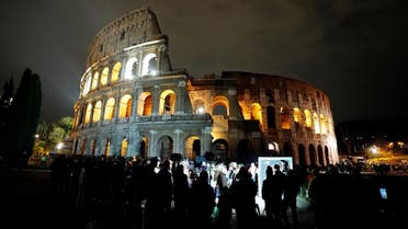 A picture taken on March 24, 2018 shows the ancient Colosseum normal lighted during the Earth Hour initiative in Rome. (AFP)