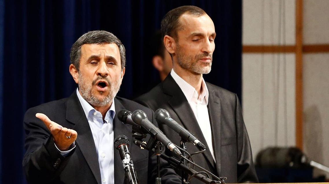 Former Iranian president Mahmoud Ahmadinejad (L) speaks, as he is accompanied by former Iranian Vice President Hamid Baghaei. (File photo: AFP)