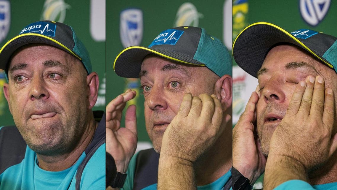 Head Coach of the Australia cricket team Darren Lehmann wiping his eyes and responding to questions during a press conference in Johannesburg on March 29, 2018 at which he announced his resignation after the forthcoming Test match against South Africa. (AFP)