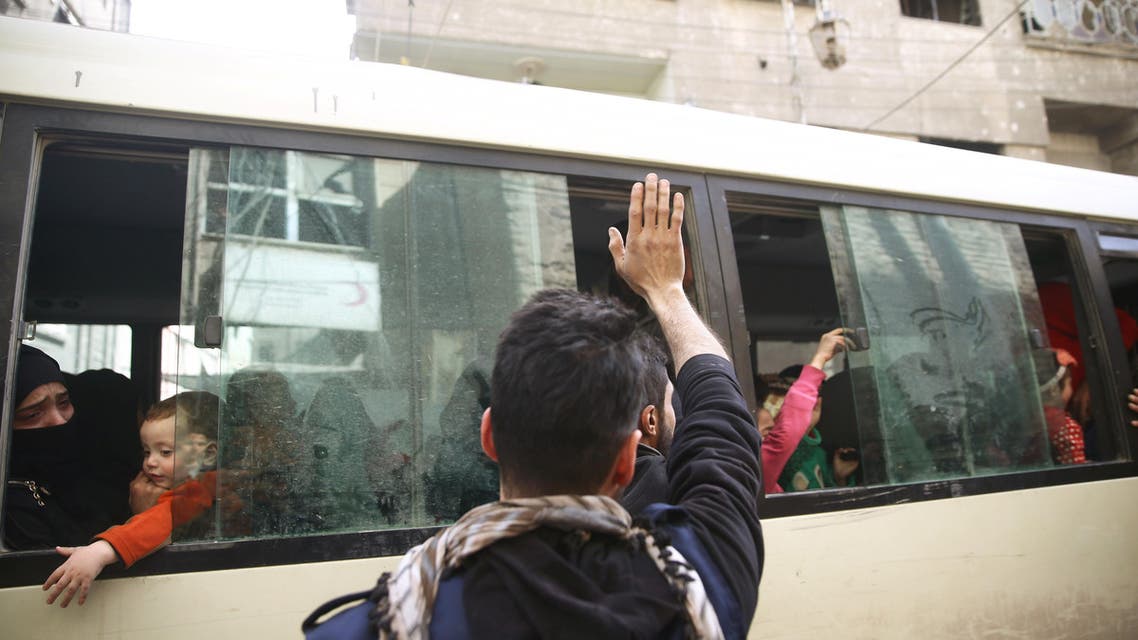 Douma eastern ghoura syria evacuating bus. (Reuters)