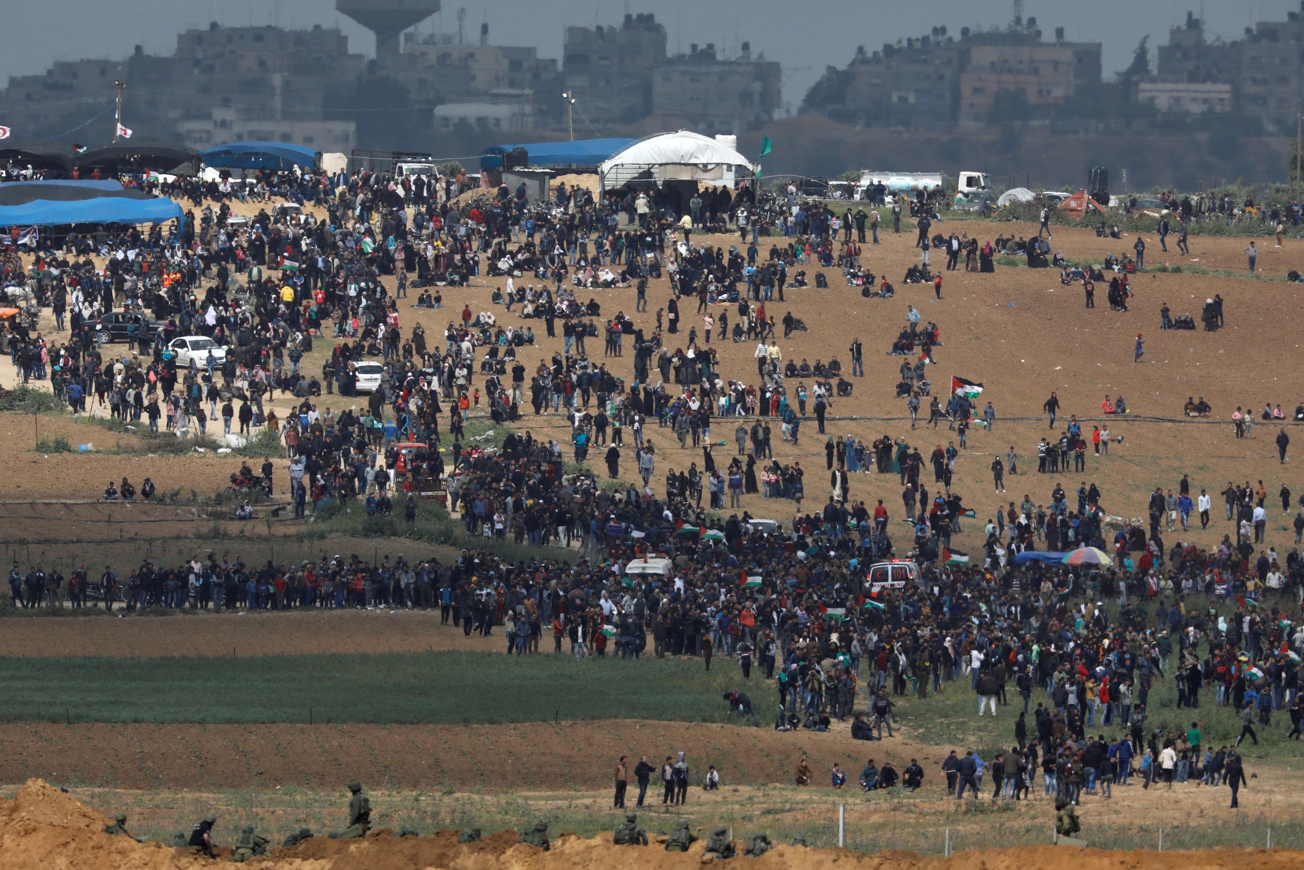 Palestinians attend a tent city protest along the Israel border with Gaza, demanding the right to return to their homeland, east of Gaza City March 30, 2018. REUTERS