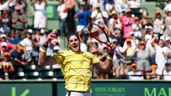 Isner outlasts Zverev for first Miami title