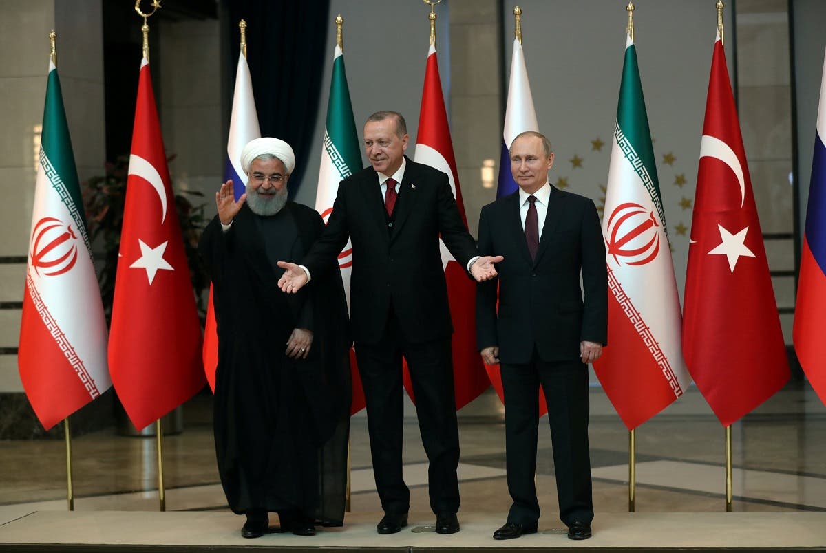 Presidents Rouhani of Iran, Erdogan of Turkey and Putin of Russia pose before their meeting in Ankara. (File photo: Reuters)