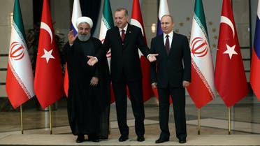 Presidents Rouhani of Iran, Erdogan of Turkey and Putin of Russia pose before their meeting in Ankara. (Reuters)