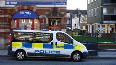 A police van parked at the Upper Clapton Road in east London where a man died from stab wounds on the night of April 4, 2018. (Reuters)