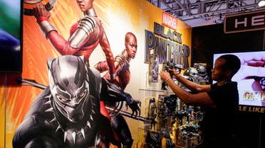 An exhibitor organizes ‘Black Panther’ items at the Hasbro showroom during the annual New York Toy Fair, on February 20, 2018, in New York. (AFP)