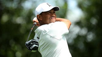 Golf: Woods happy with progress despite falling off the pace