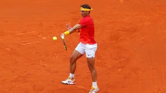 Record-setter Rafael Nadal roars back in Davis Cup win