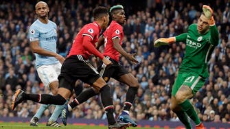 Man City collapses to United, delaying EPL title party