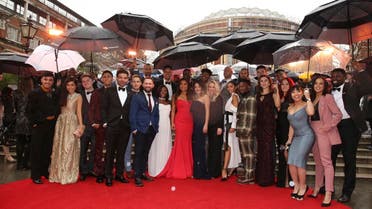 The cast of Hamilton pose for photographers upon arrival at the Olivier Awards in London. (AP)