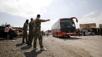 Thousands leave Syria's Douma as evacuations wrapping up