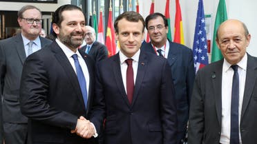 President Macron with Lebanese Prime Minister Saad Hariri in Paris on April 6, 2018. (Reuters)