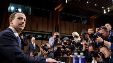 Facebook CEO Mark Zuckerberg takes his seat as he arrives to testify before a joint hearing of the Commerce and Judiciary Committees on Capitol Hill in Washington, Tuesday, April 10, 2018, about the use of Facebook data to target American voters in the 2016 election. (AP)