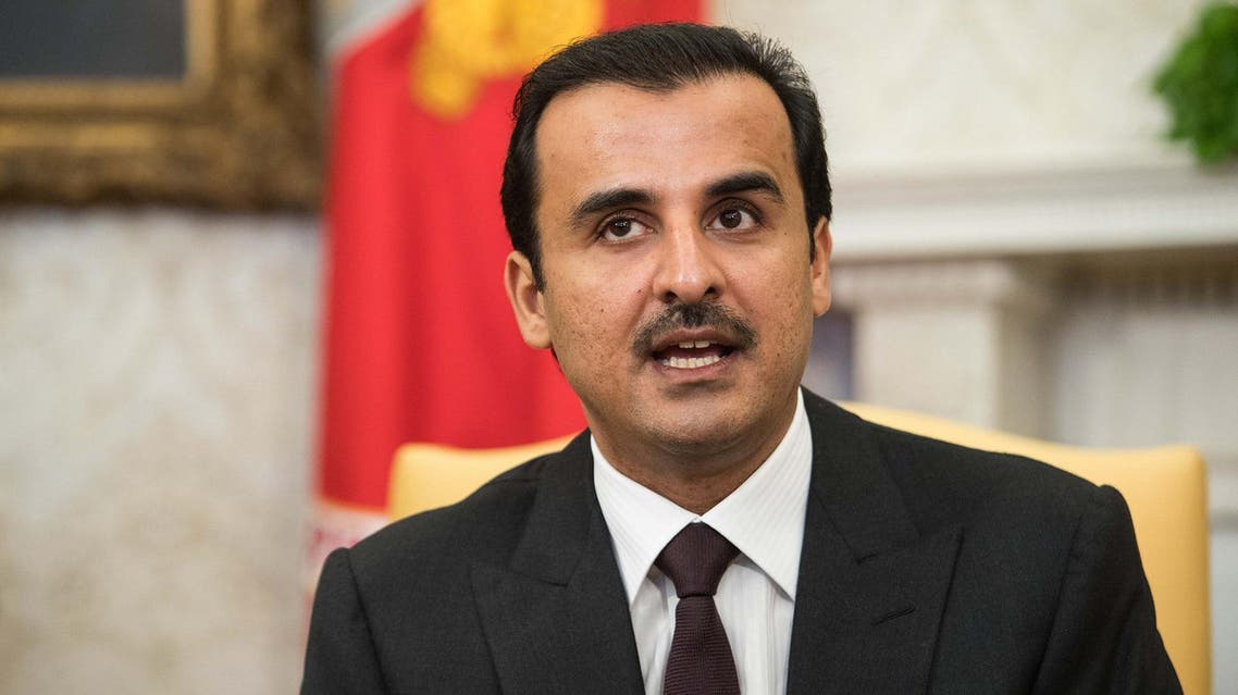 Qatar Emir Tamim speaks to the press with US President Donald Trump at the White House in Washington, DC, on April 10, 2018. (AFP)