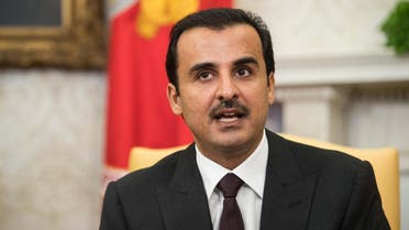Qatar Emir Tamim speaks to the press with US President Donald Trump at the White House in Washington, DC, on April 10, 2018. (AFP)