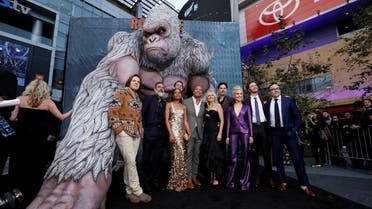 Cast members Lacy, Morgan, Harris, Liles, Johnson, Akerman, Manganiello, Hill, Quaid and Byrne pose at the premiere for the movie "Rampage" in Los Angeles. (Reuters)