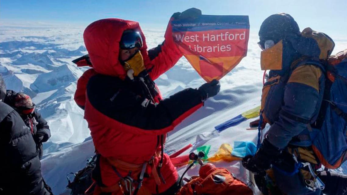 In this May 2017 photo, Sherpa displays a flag from West Hartford, Conn., on the summit of Mount Everest in Nepal. (Courtesy of Lhakpa Sherpa via AP)