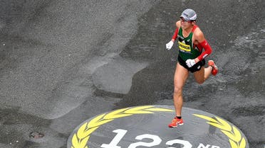 Yuki Kawauchi runs down Boylston Street towards the finish of the 2018 Boston Marathon. (Reuters)