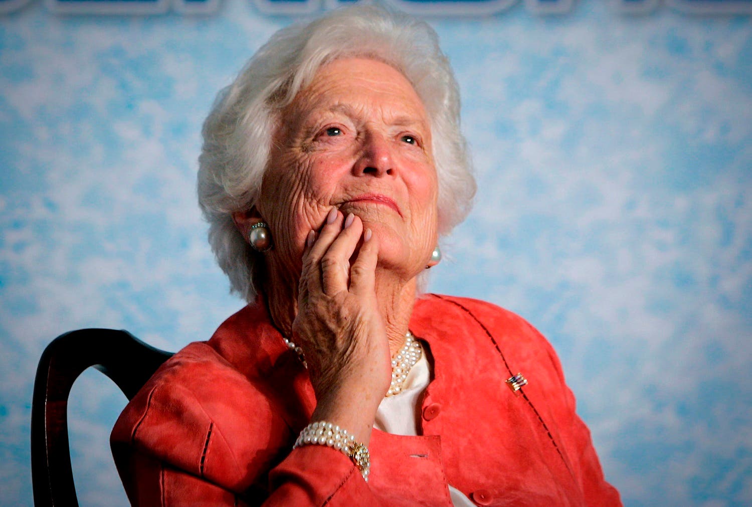 In this file photo from Friday, March 18, 2005, former first lady Barbara Bush listens to her son, President George W. Bush, as he speaks on Social Security reform in Orlando, Fla. (AP)