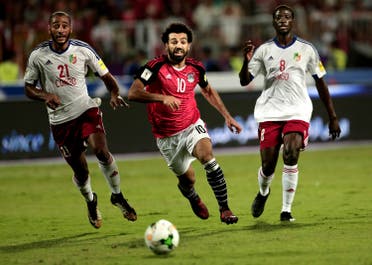 Egypt’s Mohamed Salah, (center), battles for the ball with Congo’s Delvin N’Dinga, (right), and Tobias Badila during the 2018 World Cup group E qualifying soccer match at the Borg El Arab Stadium in Alexandria, Egypt. (AP)