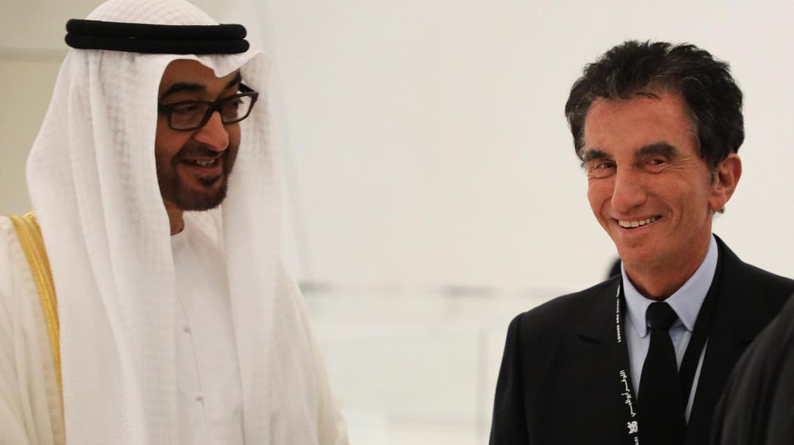 Jack Lang (R), speaks with Abu Dhabi Crown Prince Mohammed bin Zayed Al-Nahyan as they visit the Louvre Abu Dhabi Museum on November 8, 2017 during its inauguration on Saadiyat island in the Emirati capital. (AFP)