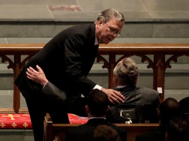 Former Florida Governor Jeb Bush comforts his father, former President George H.W. Bush during a funeral service for his mother, former first lady Barbara Bush. (AP) 
