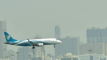 A file picture shows a Oman air plane landing at at Dubai's International Airport. (AFP)