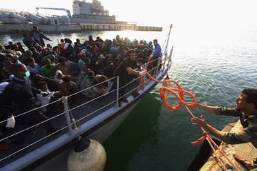 Illegal migrants of different African nationalities arrive at a naval base in the capital Tripoli on April 22, 2018, after they were rescued off the coast of Zlitan from two inflatable boats. (AFP)