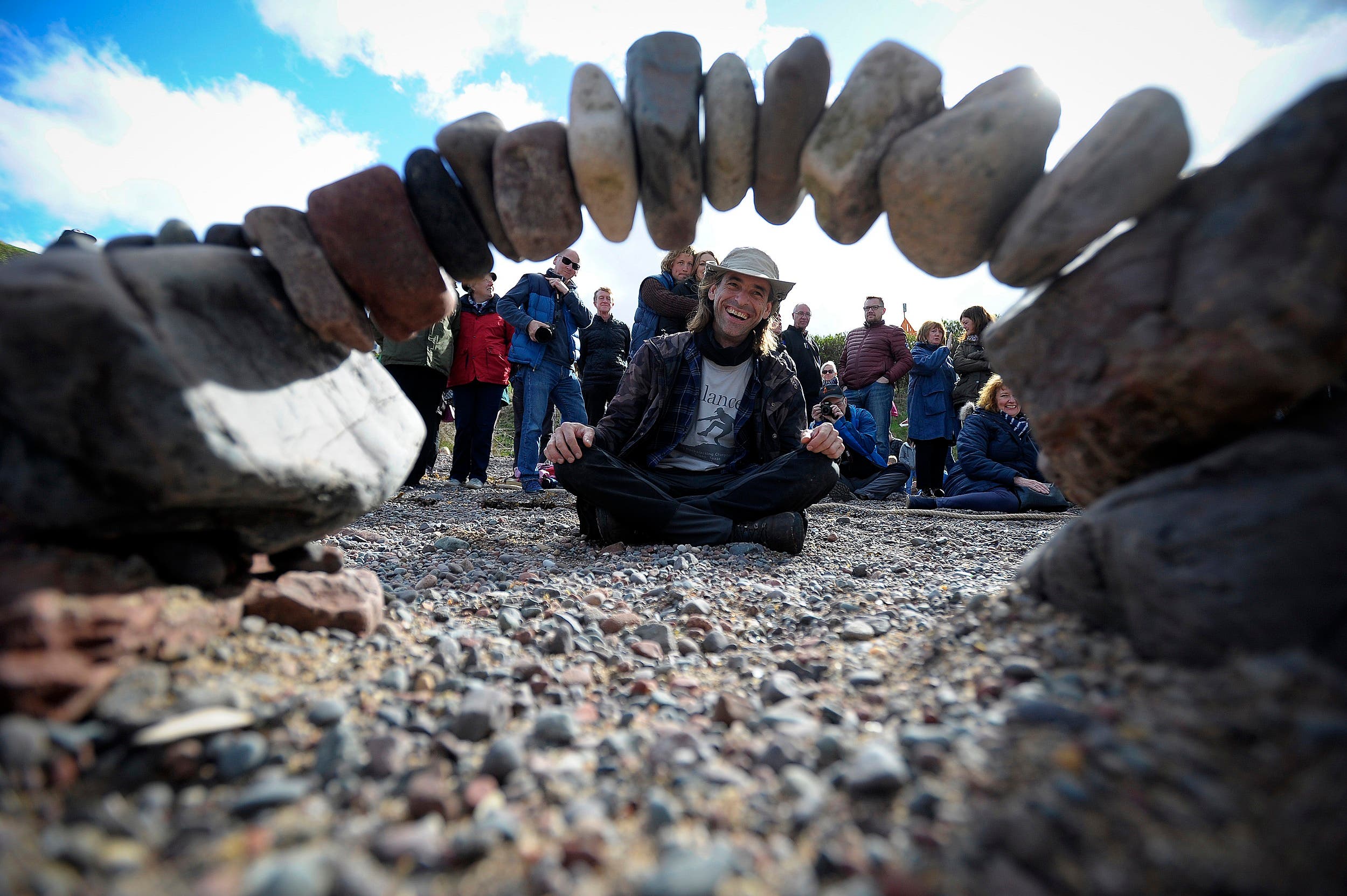 Overall winner, Pedro Duran from Spain, competes in the European Stone Stacking Championships 2018 in Dunbar, Scotland, on April 22, 2018. (AFP)