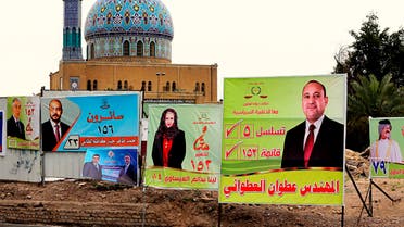 Campaign posters for parliamentary elections adorn a street in Baghdad, Iraq, Sunday, April 22, 2018. (AP)