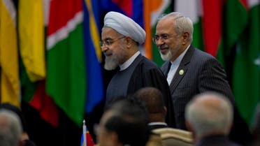 Iran’s President Hassan Rouhani (L) arrives to attend the Asian-African Conference in Jakarta on April 23, 2015. (AFP)