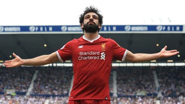 Liverpool's Egyptian midfielder Mohamed Salah celebrates scoring their second goal during the English Premier League football match against West Bromwich Albion. (AFP)