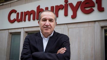 In this May 3, 2015 file photo, Akin Atalay, the chairman of the opposition Cumhuriyet daily, stands outside his newspaper's headquarters in Istanbul. (AP)