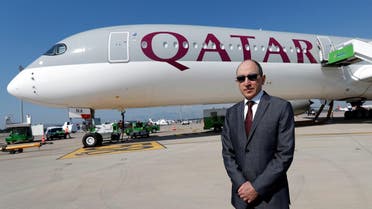 Qatar Airways Chief Executive Officer Akbar al-Baker poses in front of an Airbus A350-1000 at the Eurasia Airshow in the Mediterranean resort city of Antalya, Turkey, on April 25, 2018. (Reuters) 
