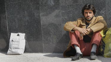 An Iranian temporary manual worker waits for work in Tehran on March 11, 2008. (AFP)