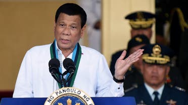 Philippine President Rodrigo Duterte gestures during AFP change of command ceremony in Quezon City. (AFP)