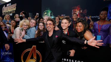 Actor Robert Downey Jr. poses with fans in Los Angeles on April 23, 2018. (Reuters)