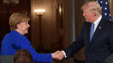 Trump and Merkel after a joint press conference at the White House on April 27, 2018. (AFP)
