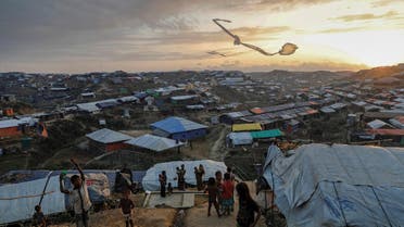 Rohingya refugee children fly improvised kites at the Kutupalong refugee camp near Cox's Bazar, Bangladesh December 10, 2017. REUTERS/Damir Sagolj TO FIND ALL PICTURES SEARCH REUTERS PULITZER