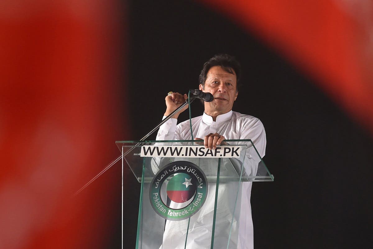 Pakistan opposition leader and leader of the Pakistani political party Pakistan Tehreek-e-Insaf (PTI - Pakistan Movement for Justice) Imran Khan delivers a speech during a political rally, in Lahore on April 29, 2018. Pakistan Tehreek-e-Insaf (PTI) displayed a strong show of power at Minar-e-Pakistan, as thousands of party supporters and workers from all over the country gathered at the ground. (AFP)