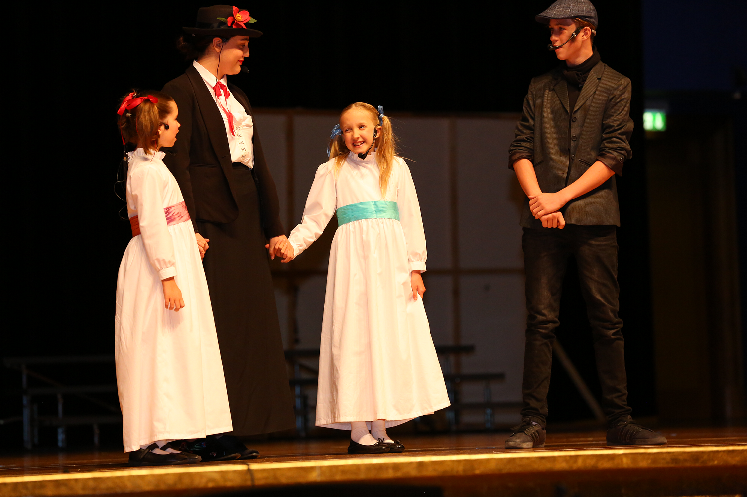 14-year-old Maya Nourse (L) playing lead role ‘Mary Poppins’ while 13-year-old Rowan Fear (R) playing the role of ‘Bert’ from the classic, ‘Mary Poppins’. (Supplied)