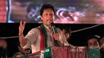 Pakistan’s Imran Khan woos poor, vows radical change in election pitch